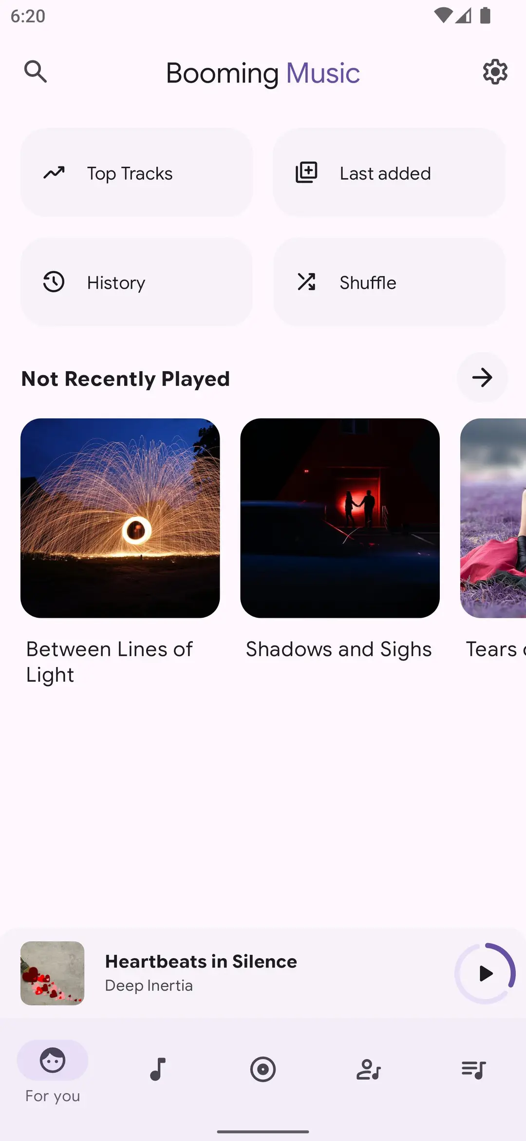 Booming Music home screen with Top Tracks, Last added, History and Shuffle shortcuts above a Not Recently Played row