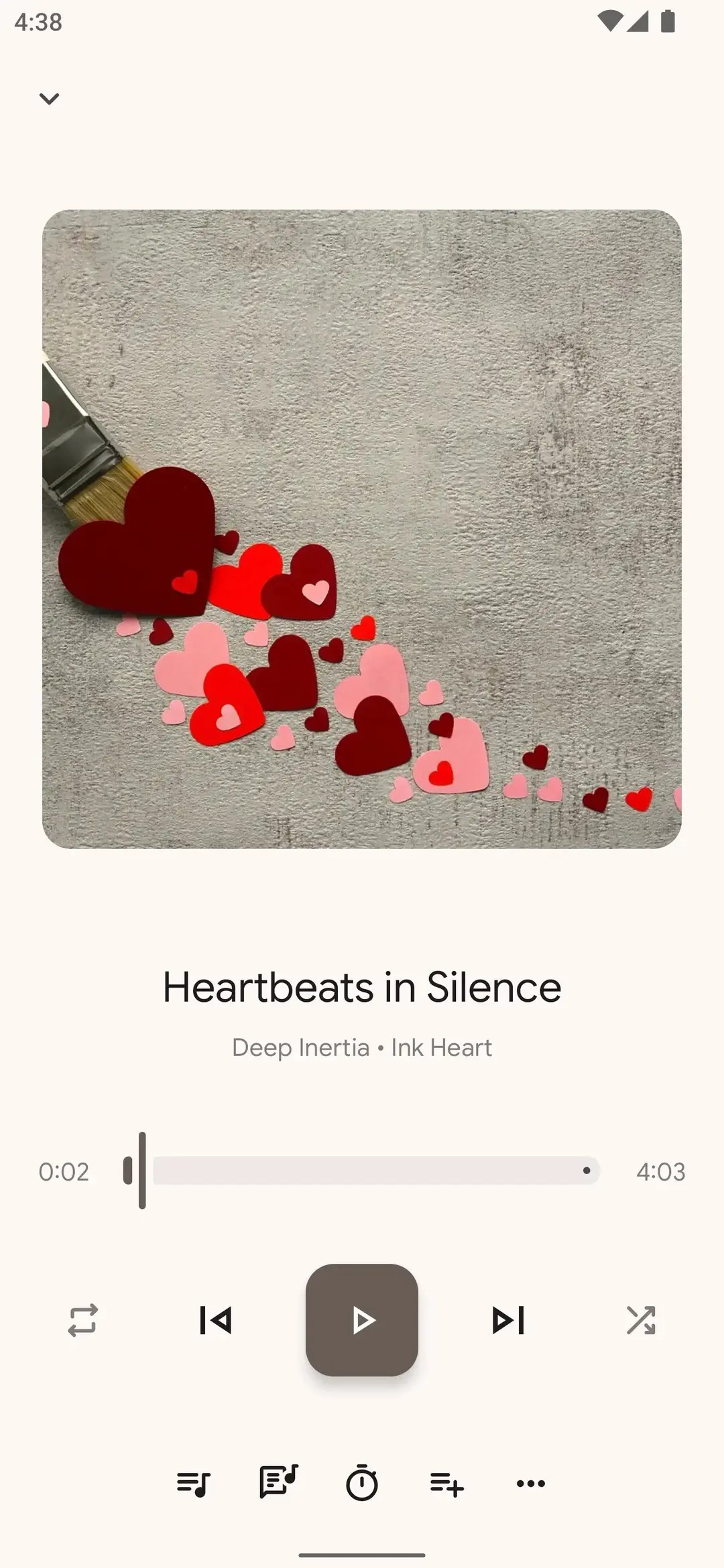 Booming Music now playing screen with full-width album art and playback controls