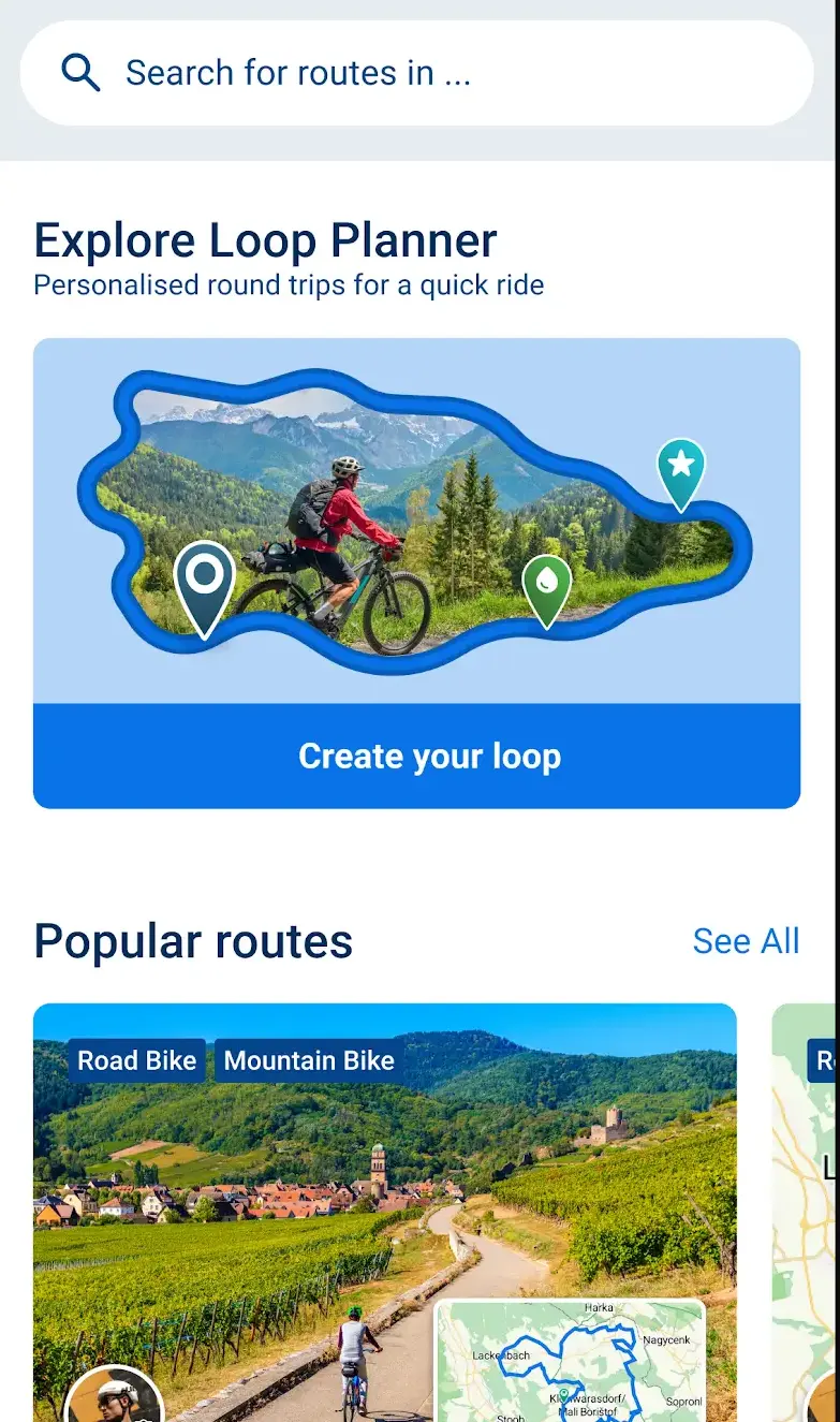 Bikemap's route discovery screen with a "Search for routes in ..." field, an Explore Loop Planner card offering personalised round trips with a Create your loop button, and a Popular routes carousel of community routes tagged Road Bike and Mountain Bike.