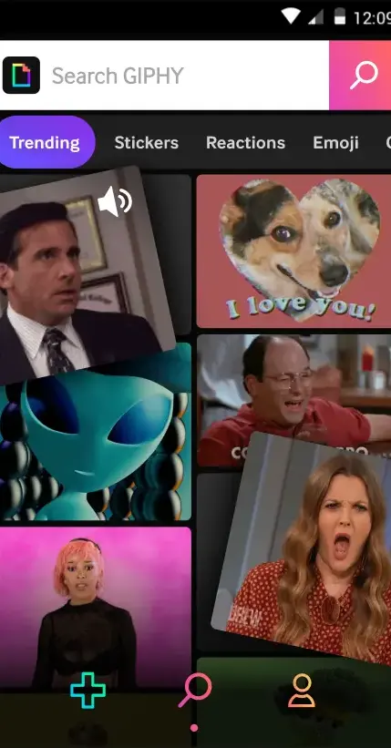 The GIPHY app browsing screen with Trending, Stickers, Reactions and Emoji tabs above a grid of animations