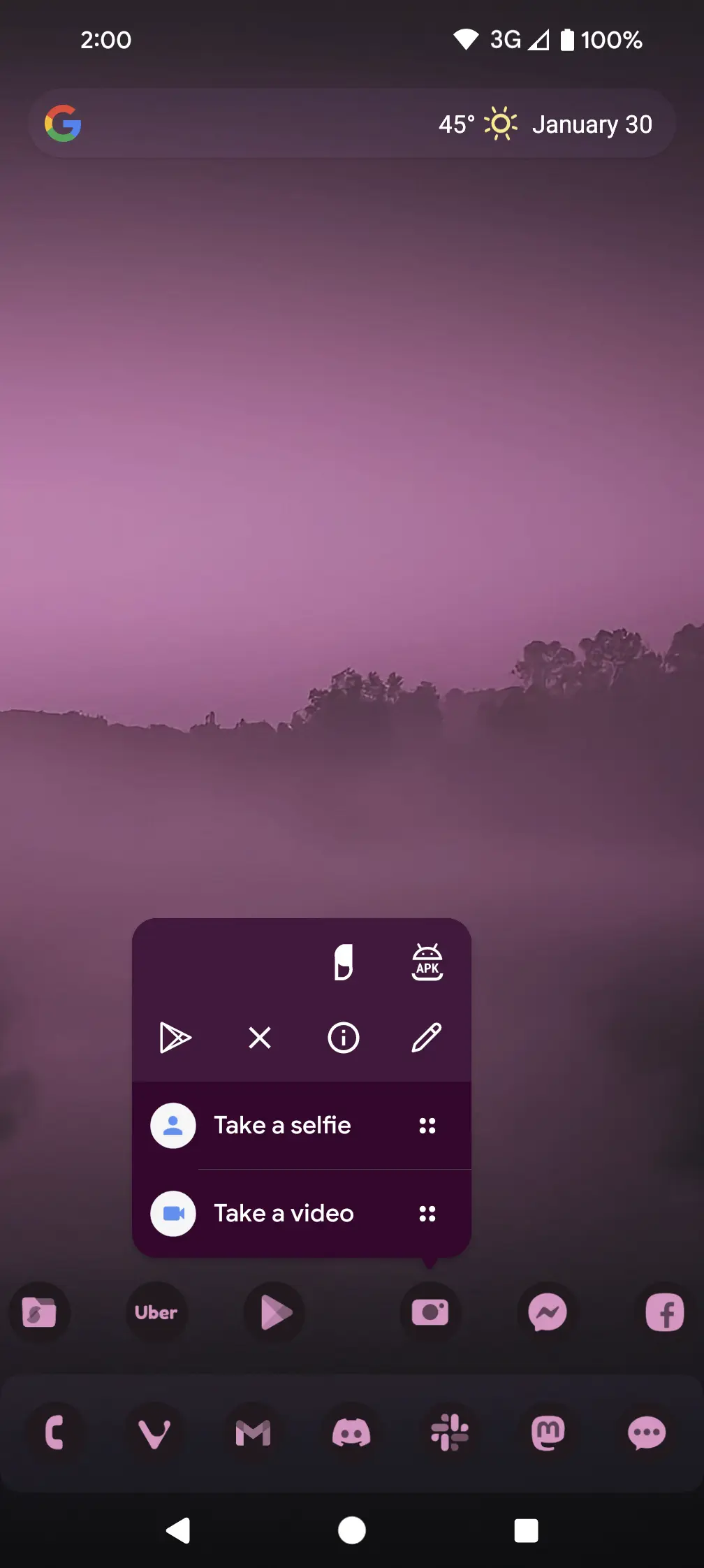 Home screen with a long-press popup showing app actions and the shortcuts Take a selfie and Take a video above the dock