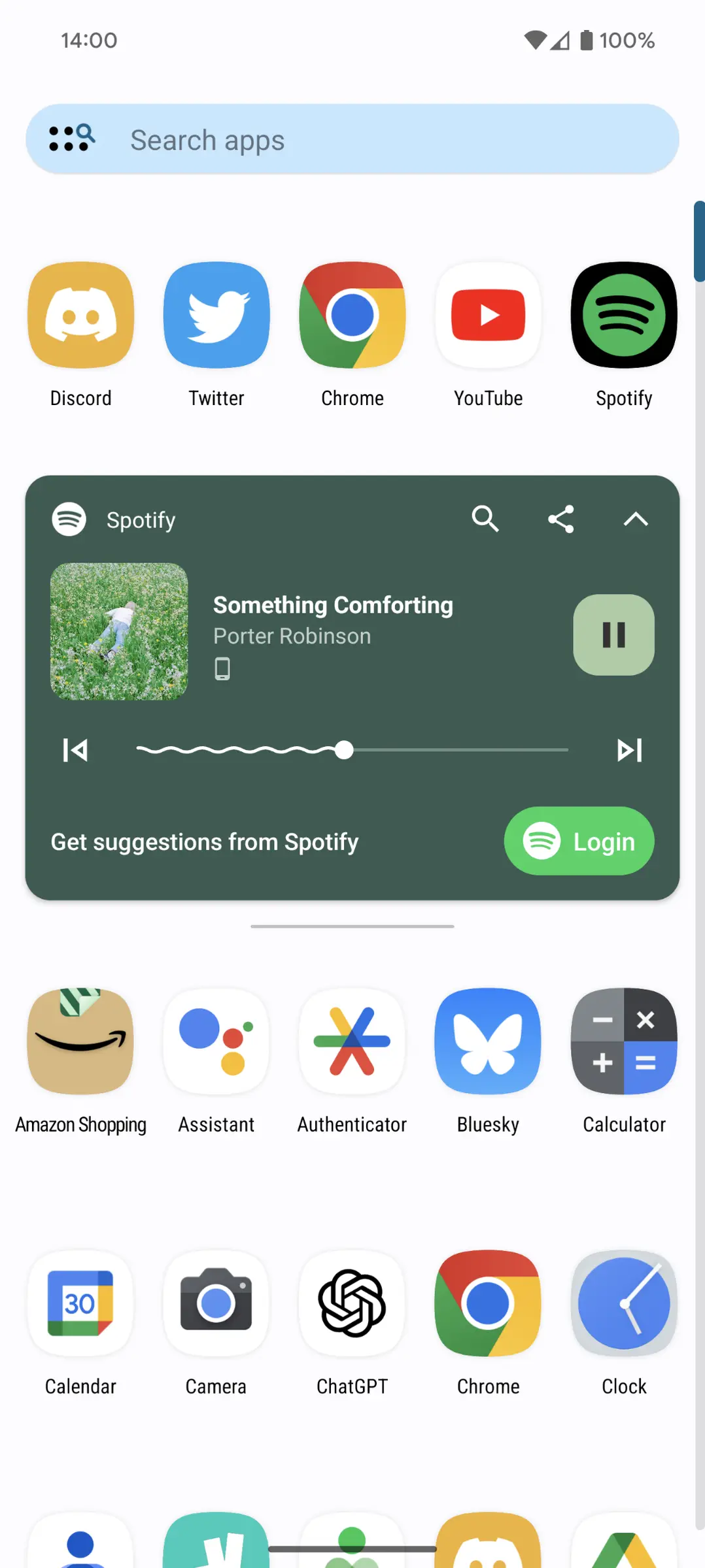 App drawer with Search apps bar, rows of app icons and a Spotify card playing Something Comforting by Porter Robinson