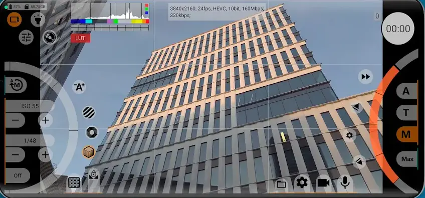 The mcpro24fps viewfinder in landscape, with manual ISO 55 and 1/48 shutter steppers plus a third control reading Off stacked down the left edge, a histogram with red, green and blue channel markers above a colour scale bar and a red LUT badge across the top next to a 3840x2160, 24fps, HEVC, 10bit, 160Mbps readout, and an A/T/M/Max exposure-mode column beside a 00:00 record timer on the right.