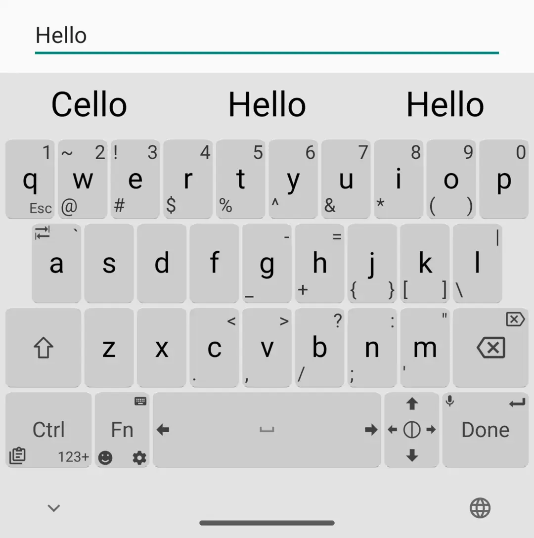 Unexpected Keyboard default light layout, with extra symbols printed in the corners of each key