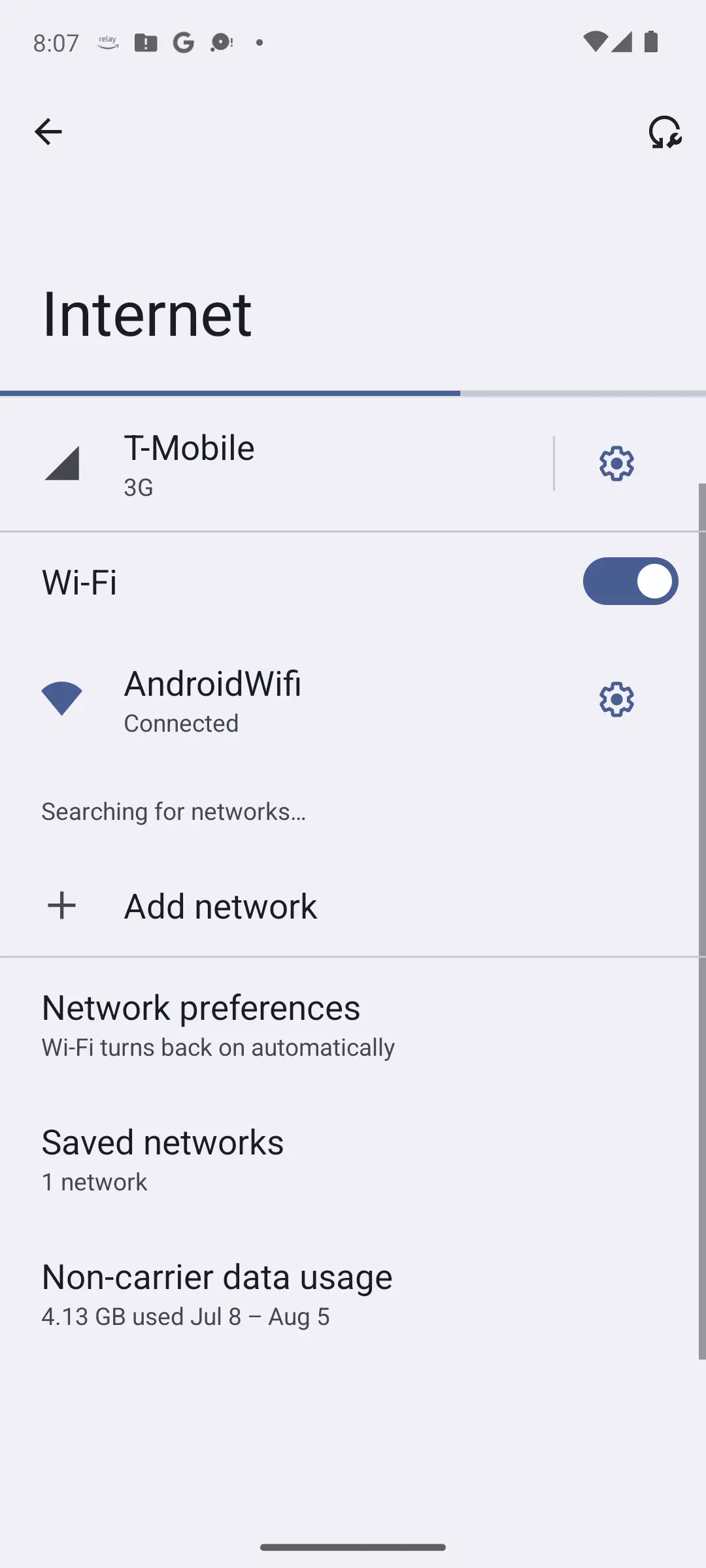 Android 14 Internet settings with the Wi-Fi toggle on, the connected network listed, and Network preferences and Saved networks below