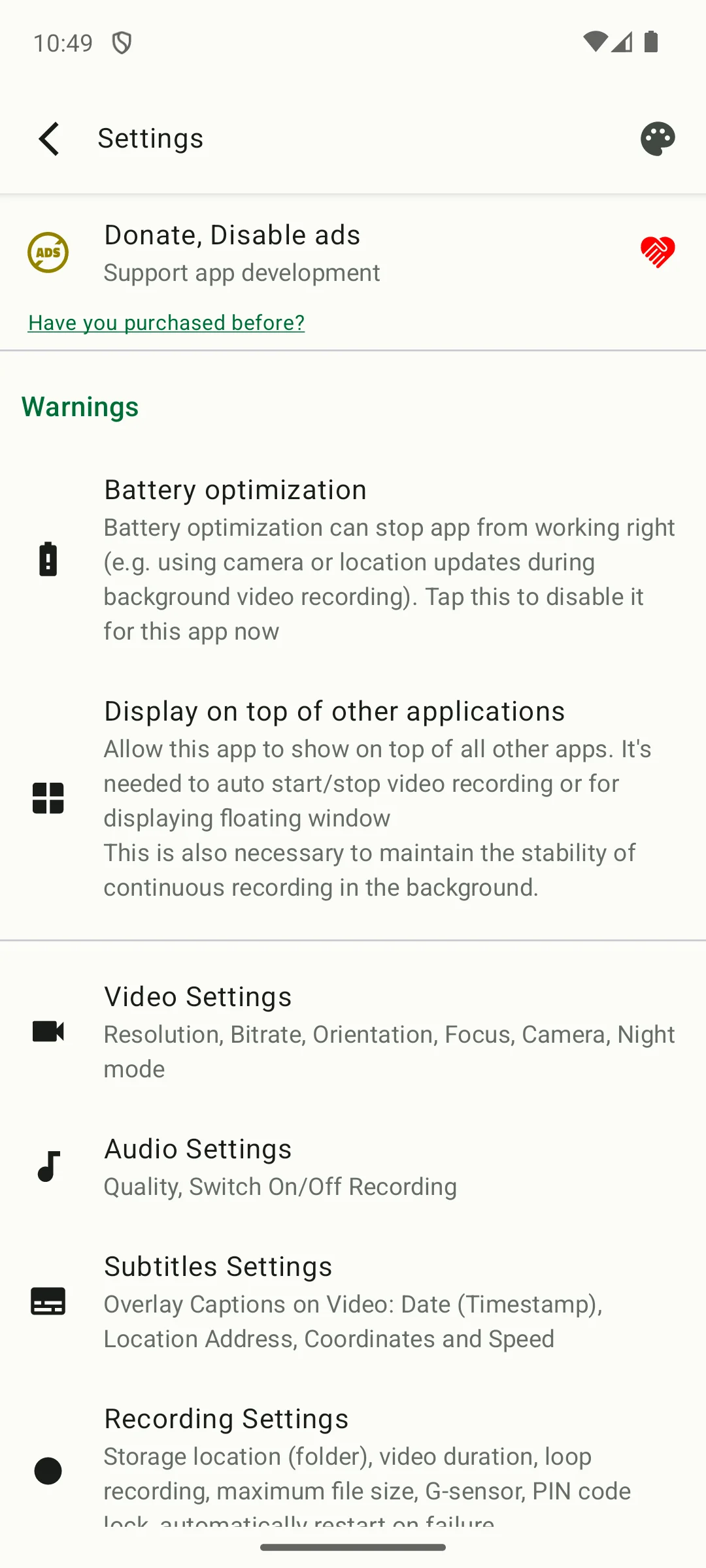 Droid Dashcam settings on Android: a warnings section about battery optimisation and display over other apps, above options for the video overlay, loop recording, maximum file size, G sensor and a PIN lock.